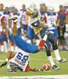 Ryan Remiorz / the canadian press
Alouettes receiver Travon Patterson is sent flying by Blue Bomber defensive back Demond Washington on Thursday. Washington has been impressive.