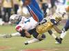 CP
Ryan Remiorz / the canadian press
Bombers' Demond Washington upends Alouettes receiver Brandon London in the first quarter Thursday night at Montreal's Percival Molson Stadium.