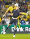 CP
Sergei Grits / the associated pressEngland�s Andy Carroll (front) and Sweden�s Olof Mellberg battle for possession of the ball during their Group D match on Friday.