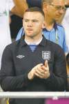 Kirsty Wigglesworth / the associated press
Wayne Rooney spectates at Friday's Group D match between Sweden and England in Kyiv.
