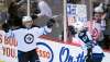 Jonathan Hayward / The Canadian Press
Winnipeg Jets Marko Dano (left) celebrates his goal with teammate Tyler Myers (57) during first period NHL action against the Vancouver Canucks in Vancouver on Monday night.