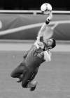 CP
Thanassis Stavrakis / the associated pressGreece�s Michalis Sifakis saves the ball during a training session Wednesday in the lead-up to the Euro 2012 soccer quarter-final match between Germany and Greece.