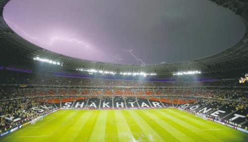 Vadim Ghirda / The Associated Press
Lightning flashes over the stadium after the weather suspended the Euro 2012 soccer championship Group D match between Ukraine and France in Donetsk, Ukraine, Friday, June 15, 2012.
