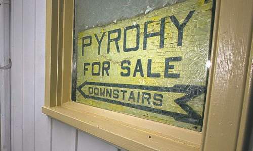 A simple wooden sign outside the Perogy Club at St. Ivan Suchavsky Uk Orthodox cathedral adverties doughy delights within. See Redekop story. June8, 2012 - (Phil Hossack Winnipeg Free Press)