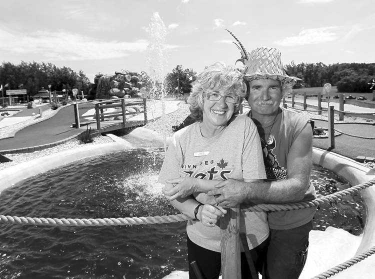 RUTH BONNEVILLE / WINNIPEG FREE PRESS
John and Sandy Cote on their new, state-of-the-art, 18-hole miniature golf course (above and below) at Geppetto�s.