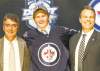 Keith Srakocic / the associated press
Defenceman Jacob Trouba, the ninth pick, shares the stage with Jets head coach Claude Noel (left) and GM Kevin Cheveldayoff in Pittsburgh Friday night.