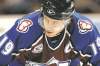 CP
David Zalubowski / the associated press archivesAvalanche centre and captain Joe Sakic waits for a faceoff in 2006. He and three other former NHL stars will be inducted into the Hockey Hall of Fame Nov. 12.