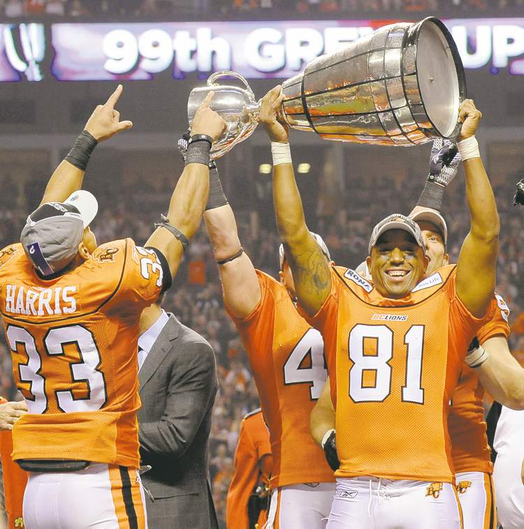 Postmedia Postmedia News
Arlen Redekop / Postmedia News archives
Geroy Simon lifts the Grey Cup and celebrates with teammates after beating guess who? Why the Bombers, of course.