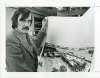 Winnipeg Tribune Fonds University of Manitoba Archives & Special Collections
A photograph of Winnipeg architect Leslie Stechesen. Stechesen has left his mark on more than 100 buildings in the city. 
This black-and-white photograph, taken by Gregg Burner on 28 November 1972, depicts Stechesen holding a drawing of his design for the Leaf Rapids Town Centre.
28 November 1972