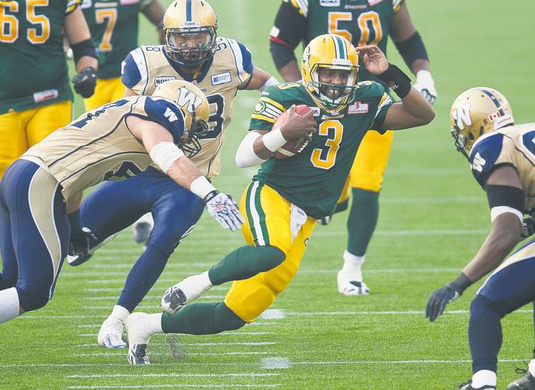 CP
john ulan / the canadian press
The Bombers couldn�t stop the run, the pass or Eskimos quarterback Steven Jyles at Commonwealth Stadium in Edmonton Friday. The Winnipeg offence wasn�t any better. As a result, the Blue are now 0-3.