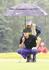 MIKE DEAL / WINNIPEG FREE PRESS
MIKE DEAL / WINNIPEG FREE PRESSMatt Hill and caddie Luke Riddly line up a shot on the 15th green in the final round of the Players Cup at Pine Ridge Sunday afternoon. Hill will be invited to the RBC Canadian Open next week in Hamilton.