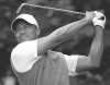 CP
Tim Hales / The Associated PressTiger Woods plays a shot off the first tee at Royal Lytham & St. Annes during the third round of the British Open Saturday.