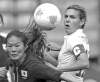 CP
Ryan Remiorz / The Canadian PressJapan�s Homare Sawa (left) and Canada�s Christine Sinclair go after a loose ball in their contest in Coventry, England.