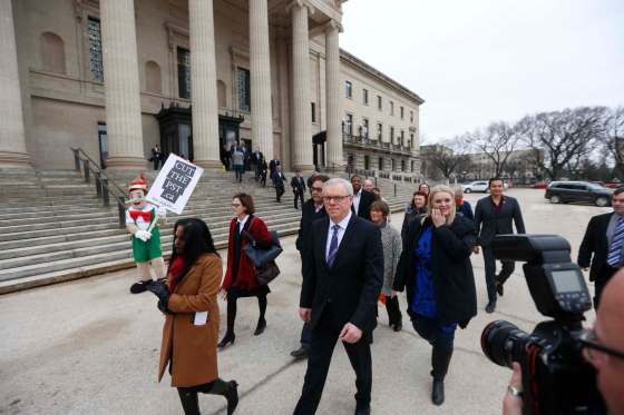 WAYNE GLOWACKI / WINNIPEG FREE PRESSA protester is seen during the NDP procession to Government House.