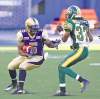 MIKE DEAL / WINNIPEG FREE PRESS
MIKE DEAL / WINNIPEG FREE PRESS
Bombers� Chad Simpson looks to run the ball past Edmonton defender Rod Williams at Canad Inns Stadium on Thursday night.