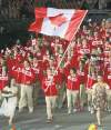 CP
Sean Kilpatrick / THE CANADIAN PRESSTriathlete Simon Whitfield carries the Maple Leaf for Team Canada as they parade in the Olympic Stadium during the opening ceremonies Friday.
