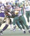 MIKE DEAL / WINNIPEG FREE PRESS archives
Bombers' Cory Watson tries to break the tackle of Edmonton's Donovan Alexander (10) during Thursday's game at Canad Inns Stadium.