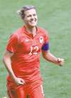 Hussein Malla / the associated press
Canada's Christine Sinclair celebrates one of her two goals Saturday in a Group F women's soccer match versus South Africa.