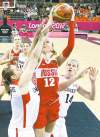 Sergio Perez / the associated press
Russia's Irina Osipova (12) fights for the ball with Canada's Courtnay Pilypaitis (left) and Chelsea Aubry (14). Russia eked out a 58-53 win.