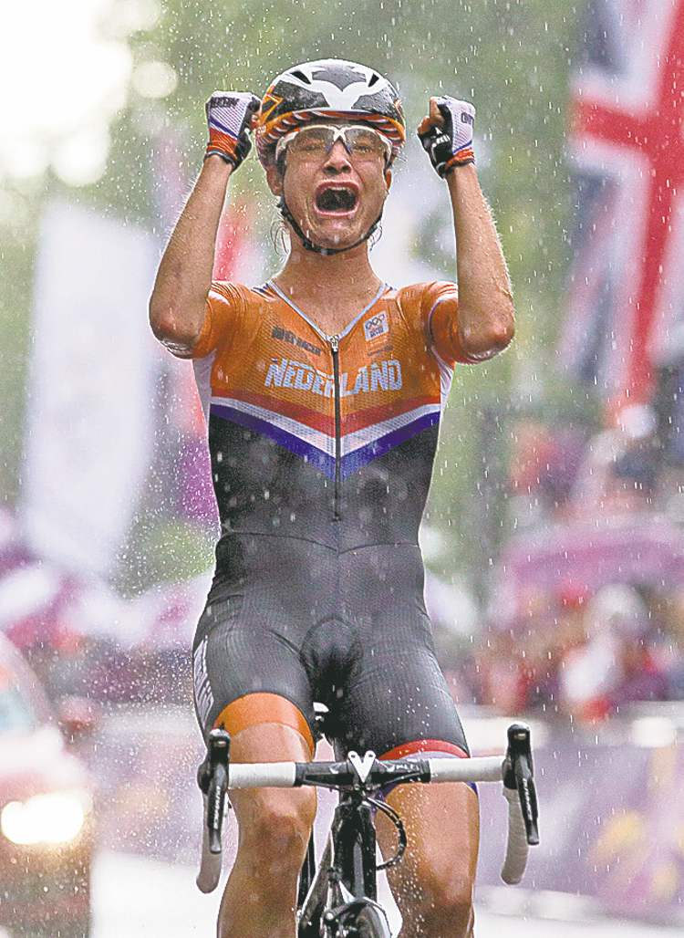 Postmedia THE CANADIAN PRESS
Frank Gunn / The Canadian Press
Marianne Vos celebrates after winning gold in the women's road race.