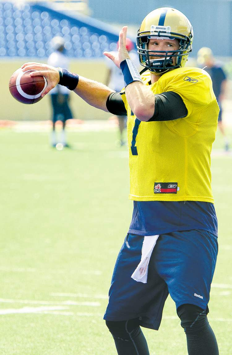 COLE BREILAND / WINNIPEG FREE PRESS
Bombers QB Alex Brink -- with a little spring in his step -- Monday at practice. The team was feeling relaxed after their first win of the season.