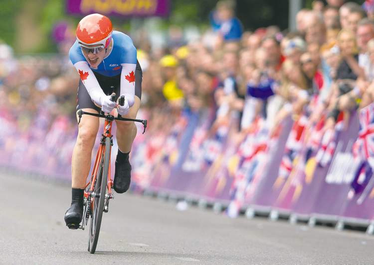 CP
Frank Gunn / the canadian press
Clara Hughes of Canada powers to the finish line in the women�s cycling time trial in London on Wednesday. She finished fifth in her last race in an Olympics.
