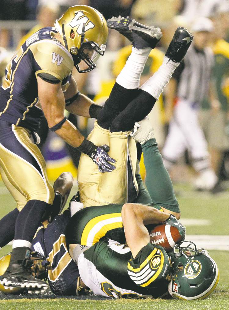 MIKE DEAL / WINNIPEG FREE PRESS
MIKE DEAL / WINNIPEG FREE press
Blue Bombers� Brady Browne (left) has his work cut out for him against the potent Montreal offence Friday night.