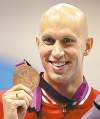 CP
Matt Slocum / the associated press
Canada�s Brent Hayden flashes a smile along with his bronze medal.