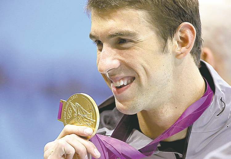Tribune Media MCT
Robert Gauthier / Los Angeles Times / MCT
Michael Phelps gained a measure of revenge on rival Ryan Lochte by thumping him in the 200 IM.
