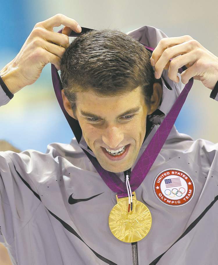 CP
Lee Jin-man / the associated press
U.S. swimmer Michael Phelps has won 17 golds and 21 medals overall � both Olympic records. Does this make him the greatest-ever Olympian or just the most prolific?