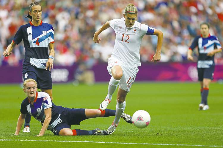 CP
Armando Franca / the associated press
Canada�s Christine Sinclair sprints through the Great Britain defence.