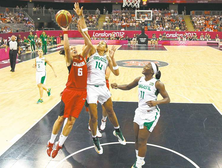CP
Mike Segar / the associated press
Canada�s Shona Thorburn drives to the hoop against Brazil�s Erika Souza (14) and Clarissa Santos during Friday�s Canadian victory.