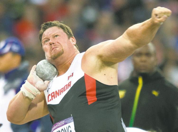 CP
Frank Gunn / THE CANADIAN PRESS
Dylan Armstrong of Canada throws in the finals of shot put. He and Canada�s other medal hopefuls were disappointed on Friday.