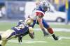 CP
John Woods / the canadian press
Winnipeg cornerback Jovon Johnson hauls down Alouettes running back Brandon Whitaker during the first half Friday night at Canad Inns Stadium.