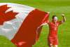 CP
FRANK GUNN / THE CANADIAN PRESSTeam Canada midfielder Diana Matheson, who scored the goal that earned Olympic bronze, parades a huge Maple Leaf flag around the pitch afterward.