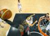 CP
Christian Petersen / the associated press
LeBron James of the United States goes up for a dunk over Carlos Delfino of Argentina in one semifinal.