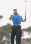 Gerry Melendez / The State / MCT
Tiger Woods gives it the old fist-pump after draining a putt on the third hole on Friday. Woods fired a one-under 71.