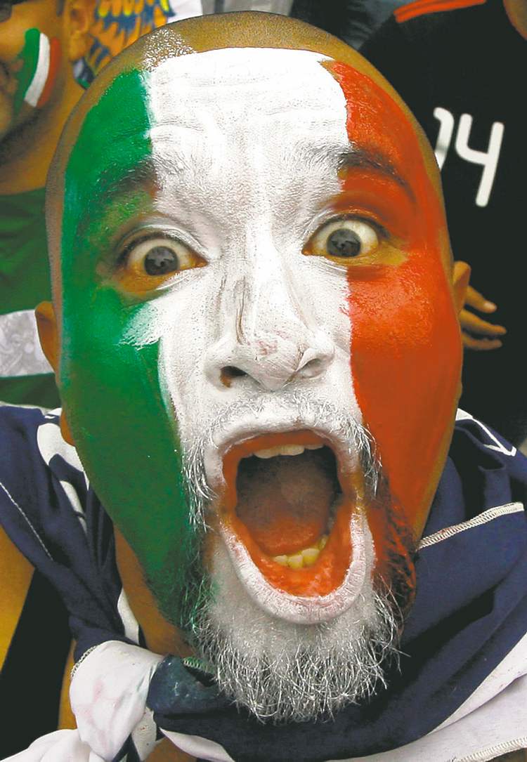 CP
Marco Ugarte / the associated press
This fan was cheering for Mexico.