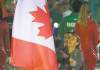 FRANK GUNN / THE CANADIAN PRESS
Christine Sinclair carries the Canadian flag into the  Olympics'  closing  ceremonies Sunday.