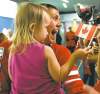 CP
darryl dyck / the canadian press
Canadian women�s soccer team captain Christine Sinclair holds her two-year-old niece Kaitlyn Sinclair as she returns to Vancouver International Airport.