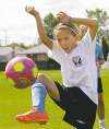 WAYNE GLOWACKI/WINNIPEG FREE PRESSKatelyn Nemis, 11, takes to the pitch Monday.