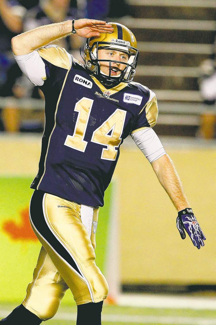 CP
John Woods / The Canadian Press
No, no, it�s us who should be saluting you, Mr. Elliott. Elliott had by far the best game of any Bombers QB this season on Thursday.