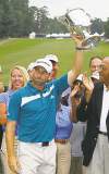 CP
gerry broome / the associated pressSergio Garcia raises the Sam Snead Cup after winning the rain delayed Wyndham Championship.