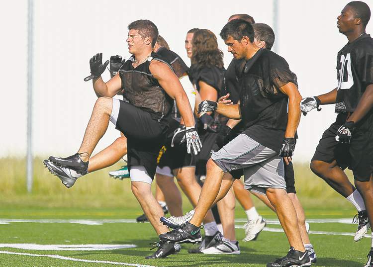 Winnipeg Free Press
john woods / winnipeg free press
Linebacker DJ Lalama (front) says there's a hunger among Bisons players to march back to the Vanier Cup.