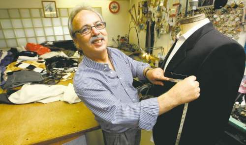 KEN GIGLIOTTI  / WINNIPEG FREE PRESS 
Giovanni Lagioia at his Osborne Street tailor shop: 'I want my customers to feel like a million bucks. You shouldn't feel like you have a suit on.'