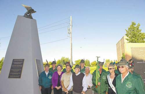 DAVID LIPNOWSKI / WINNIPEG FREE PRESS archives
Members of Winnipeg's Italian community unveil a monument at the Caboto Centre dedicated to the unjust treatment of Italians during the Second World War.