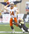 John Woods / The Canadian Press
On a night when the Bombers' defence kept the B.C. juggernaut at bay -- here Alex Hall takes down Lions quarterback Travis Lulay -- the Bombers were on the brink of a massive upset, only to have it snatched from their hands with a no-time-remaining field goal.