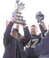 boris minkevich / winnipeg free press archives
Happier times: Paul LaPolice holds up the East Division trophy as Doug Brown looks on last November.