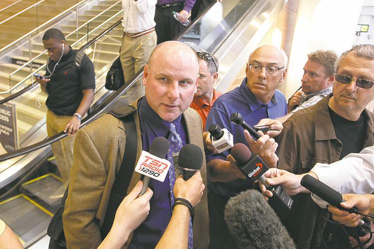 Mike Deal / Winnipeg Free Press
Winnipeg Blue Bombers head coach Paul LaPolice talks to the media at the airport in July of this season after returning from Toronto where the team lost 25-22 to the Argonauts.