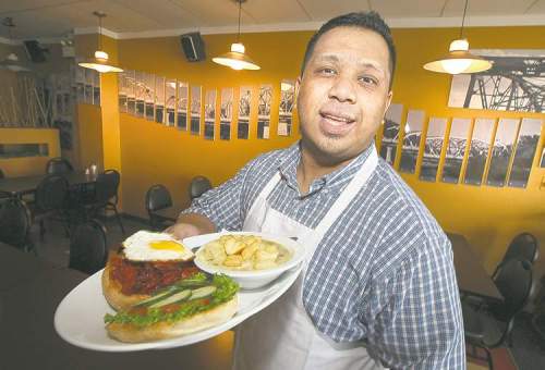 Phil Hossack / Winnipeg Free Press
Charlie Villapando with chicken pot pie soup and sweet carmelized pork bun.